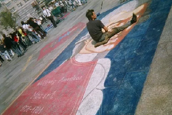 A street artist's interpretation of Mozart in Cologne — 230 years later, his image remains instantly recognizable