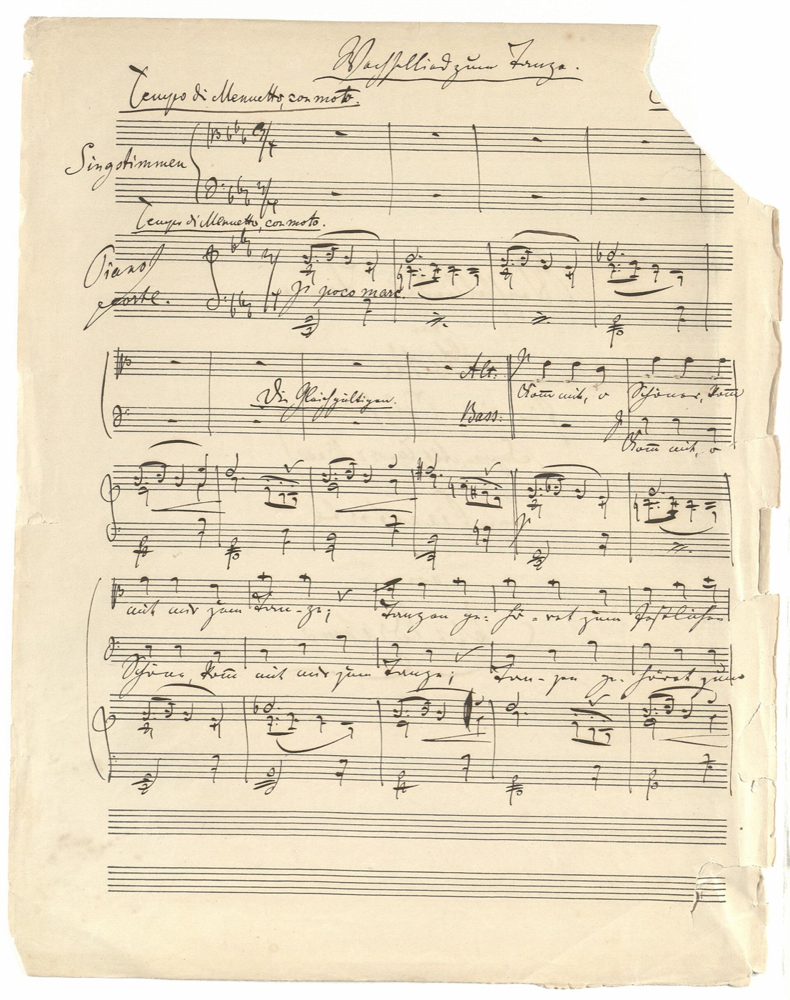 Page of handwritten music manuscript in Johannes Brahms's own hand, showing vocal and piano staves with German text