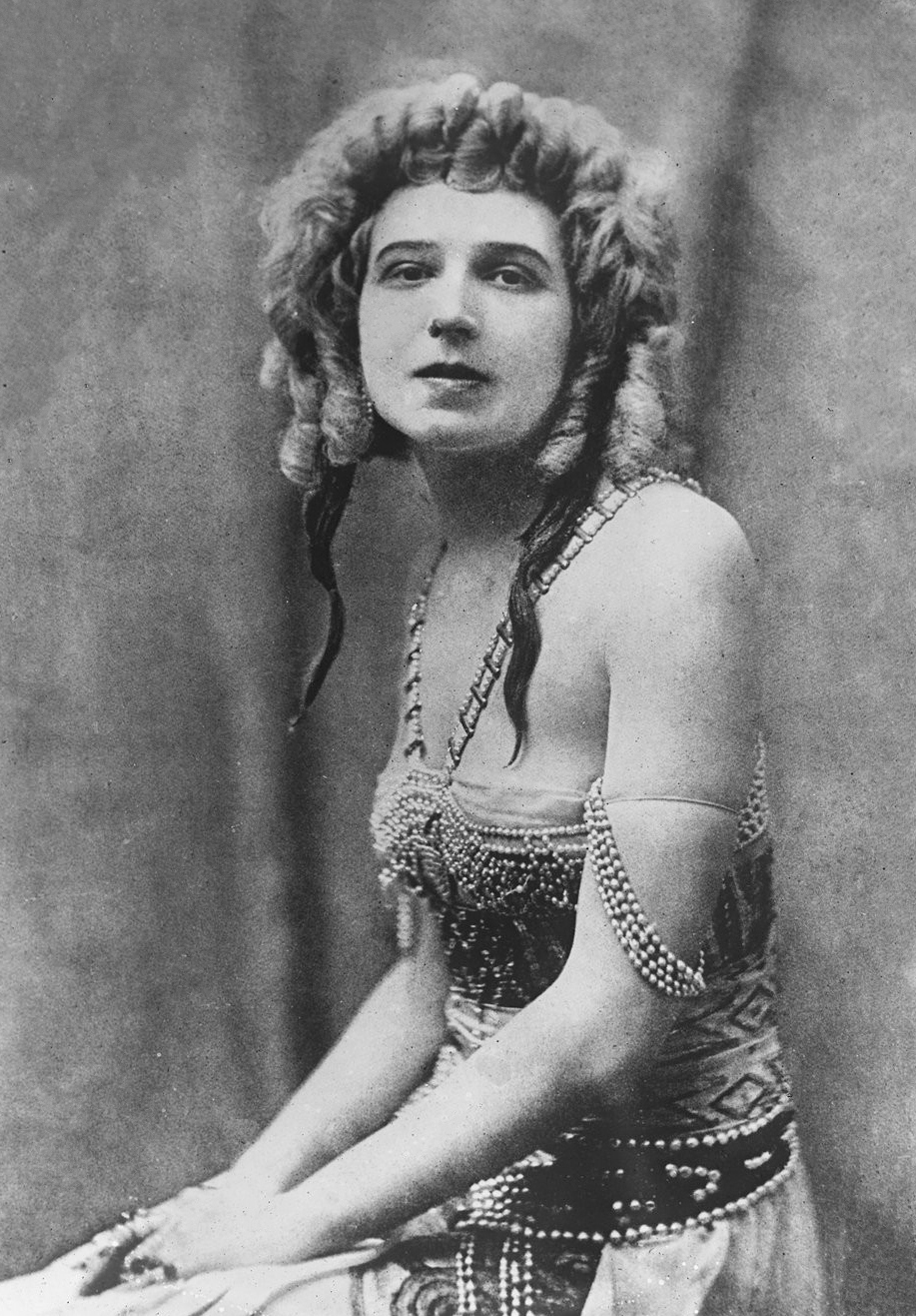Ida Rubinstein photographed in 1922, wearing an elaborate costume with pearl ornaments