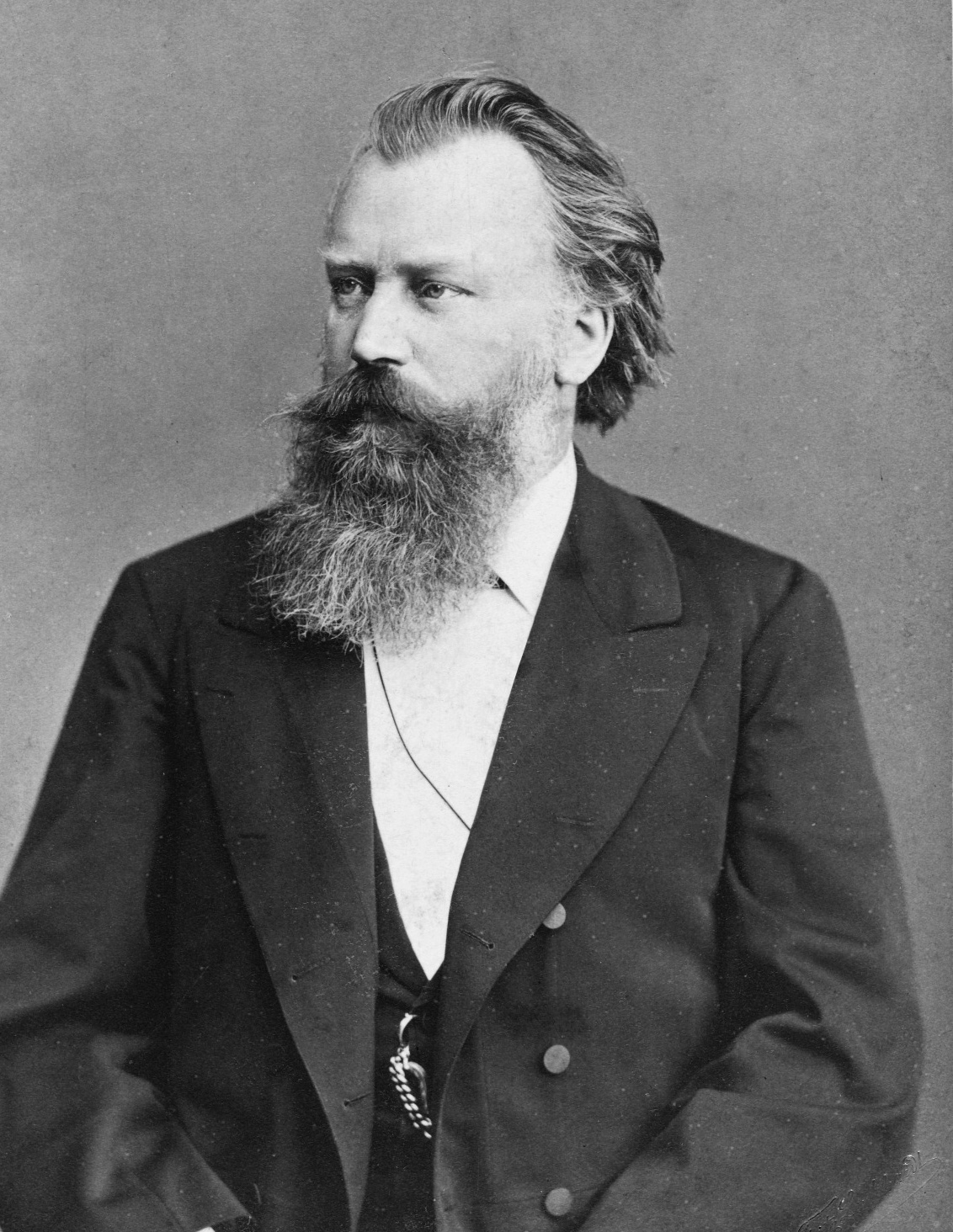 Photographic portrait of the composer Johannes Brahms with a full beard, taken by Fritz Luckhardt around 1885
