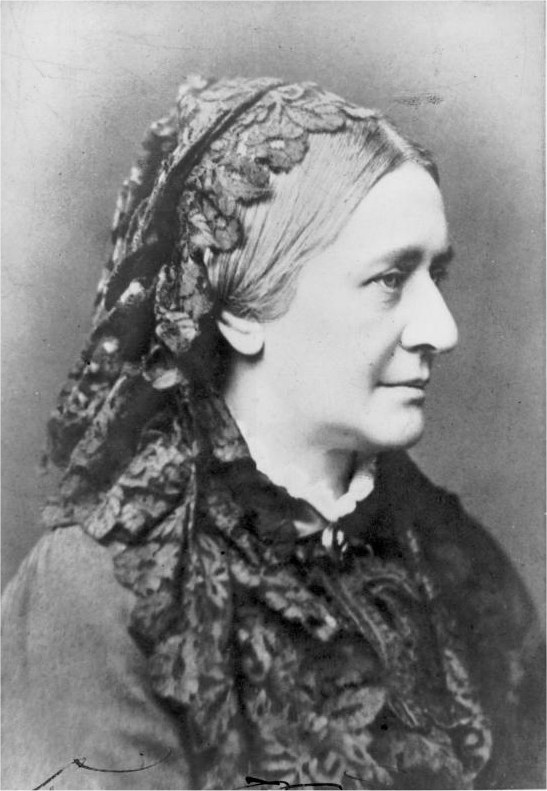 Portrait photograph of the pianist Clara Schumann in the 1880s, wearing a lace veil