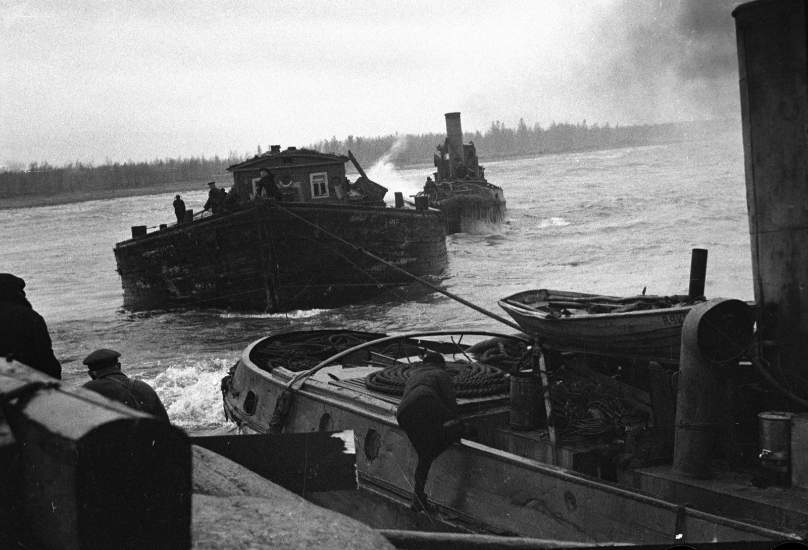 Small boats carrying food supplies across Lake Ladoga to besieged Leningrad in 1942
