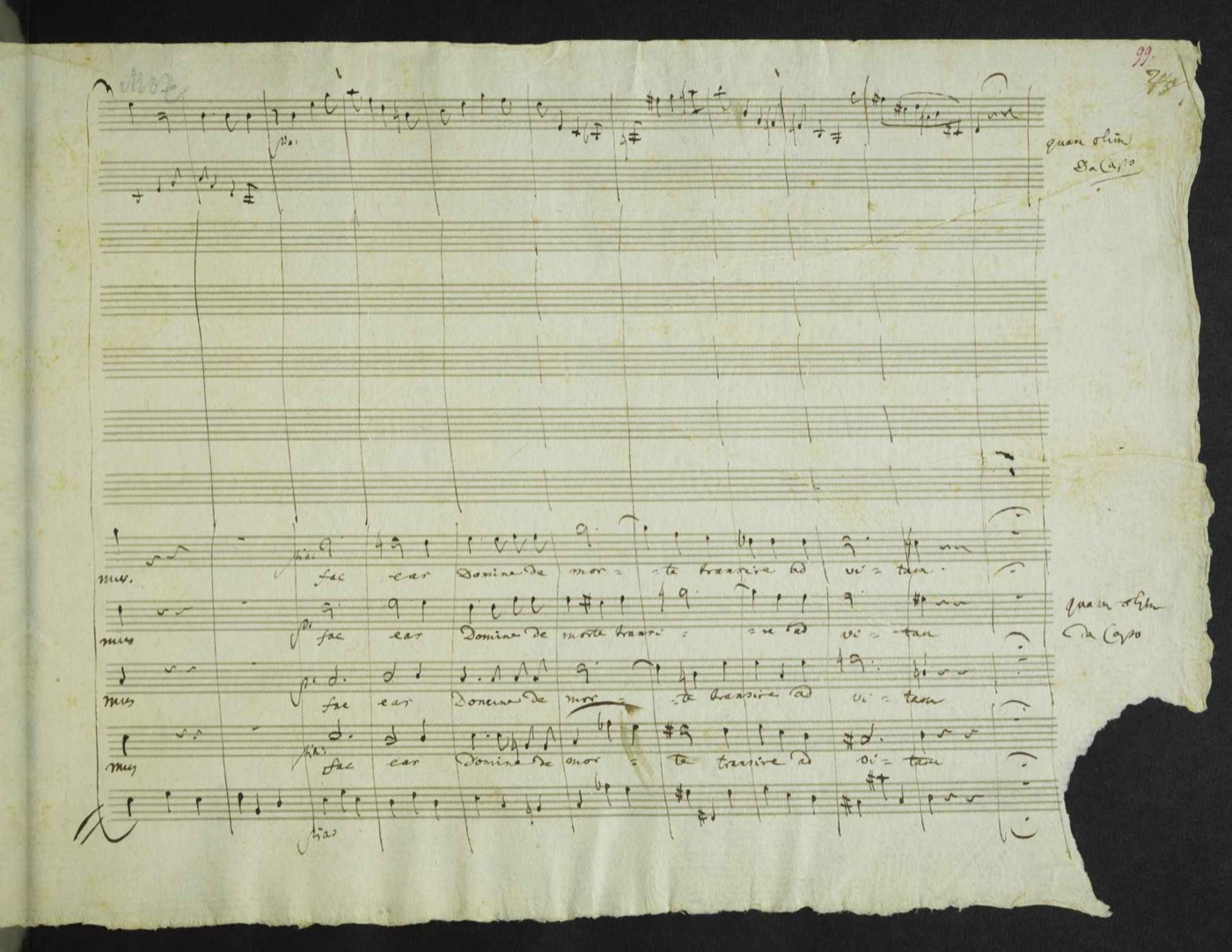 Handwritten page from the autograph working score of Mozart's Requiem K. 626, showing vocal staves with Latin text