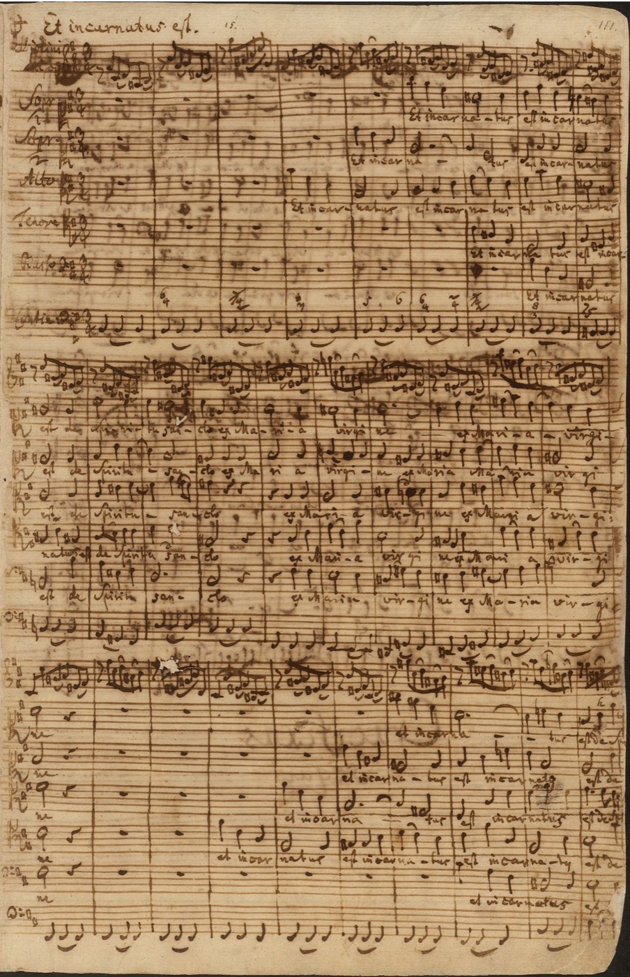 Page of Bach's autograph manuscript for Et incarnatus est from the Mass in B minor, showing dense multi-stave choral and string writing