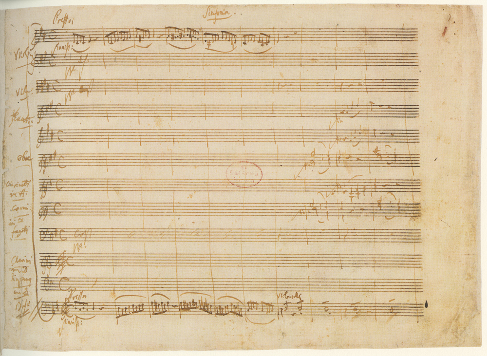 First page of the handwritten autograph score of the overture to Mozart's opera Le nozze di Figaro, showing the word Sinfonia at the top